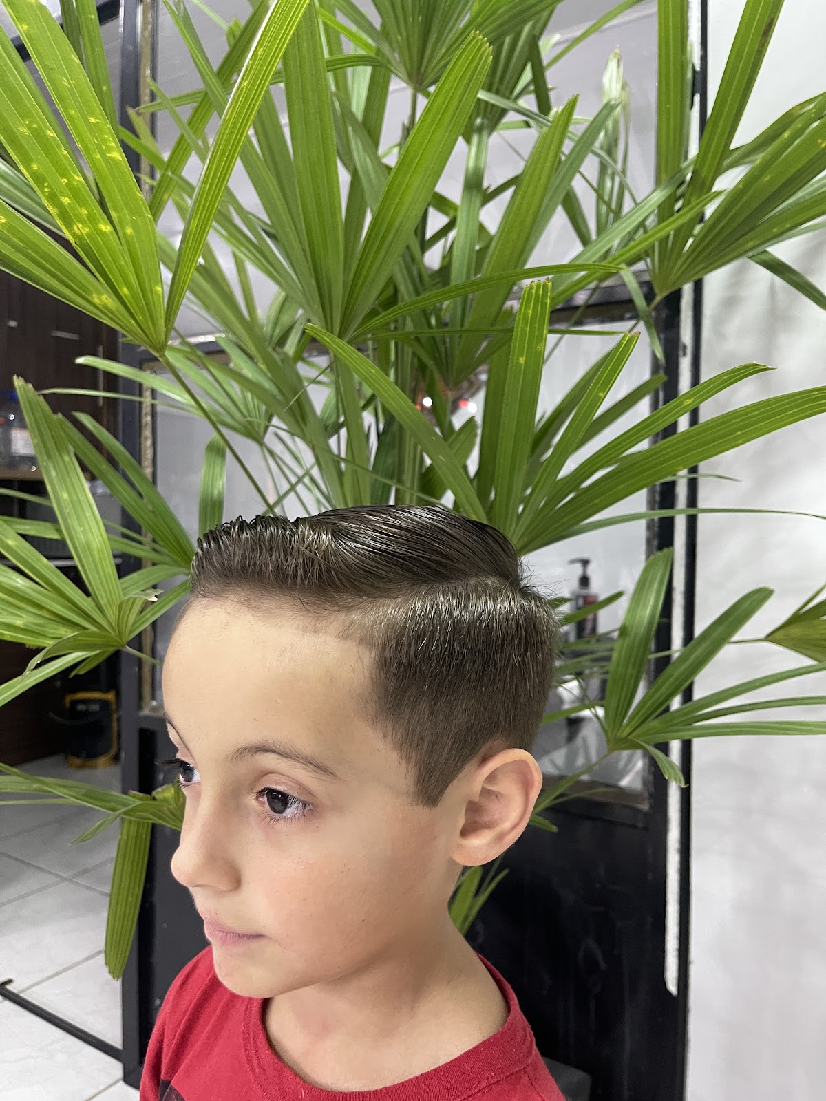 Corte infantil finalizado na Barbearia Império Ferreira